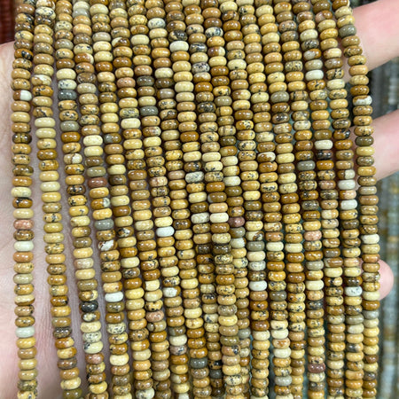 Perles rondelles en rhodonite noire 4x6mm 5x8mm