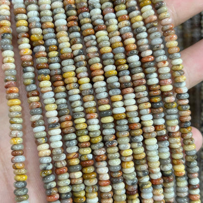 Perles rondelles en rhodonite noire 4x6mm 5x8mm