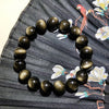 A Gold Obsidian Bracelet 8''