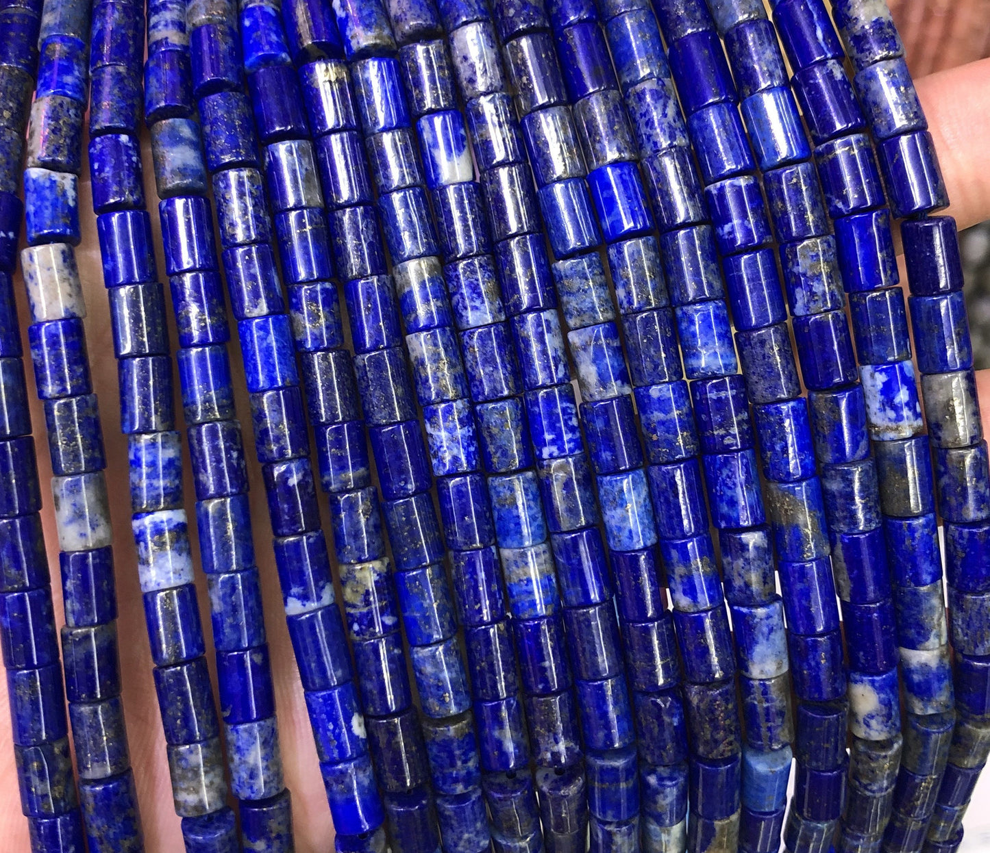 Perles tubulaires en lapis-lazuli 5,4 x 7,5 mm, 38 cm