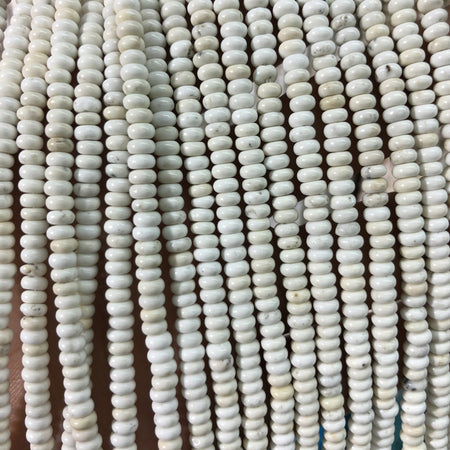 Pierre rondelle turquoise magnésite blanche 2x4mm 15''